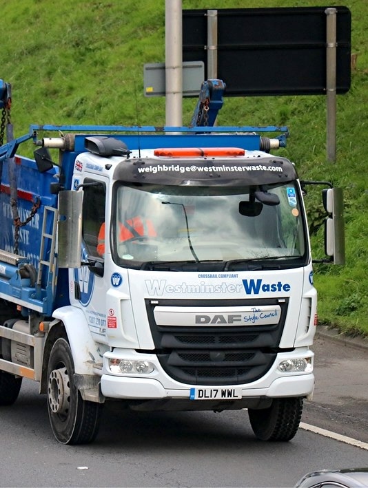 Westminster Waste skip lorry on the road, monitored by Fleet Focus AI-powered safety technology.