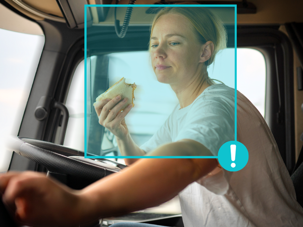 AI-powered fleet camera detecting a distracted driver eating while driving.