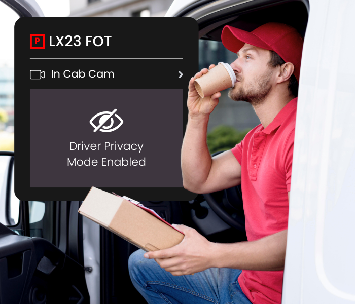 Fleet driver on a lunch break inside a parked van with AI-powered driver privacy mode enabled.